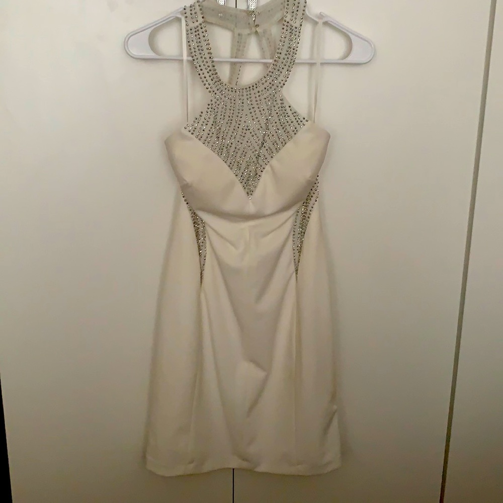 White dress with elegant silver decoration